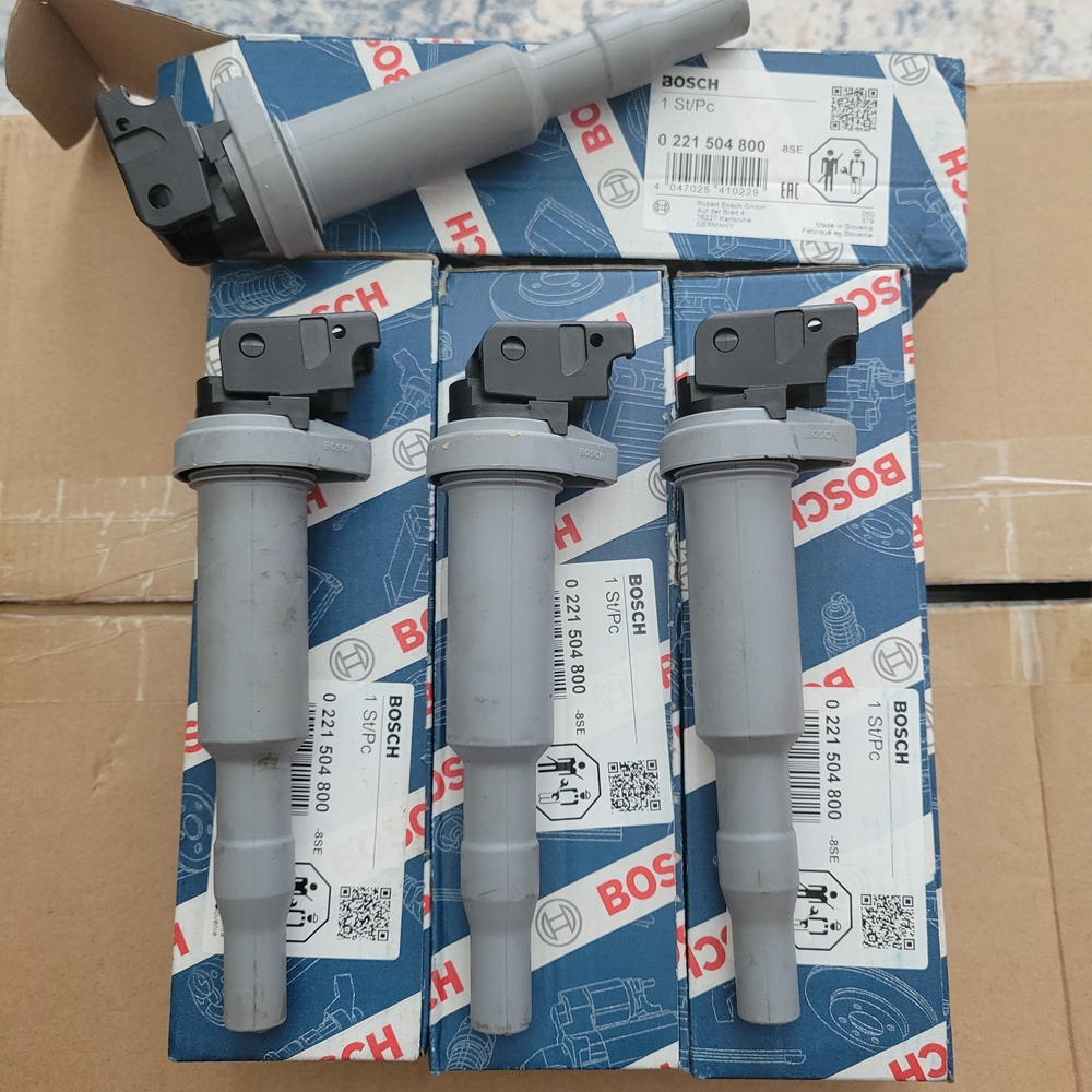 Bosch Ignition Coils Set of 4 And Valve Cover